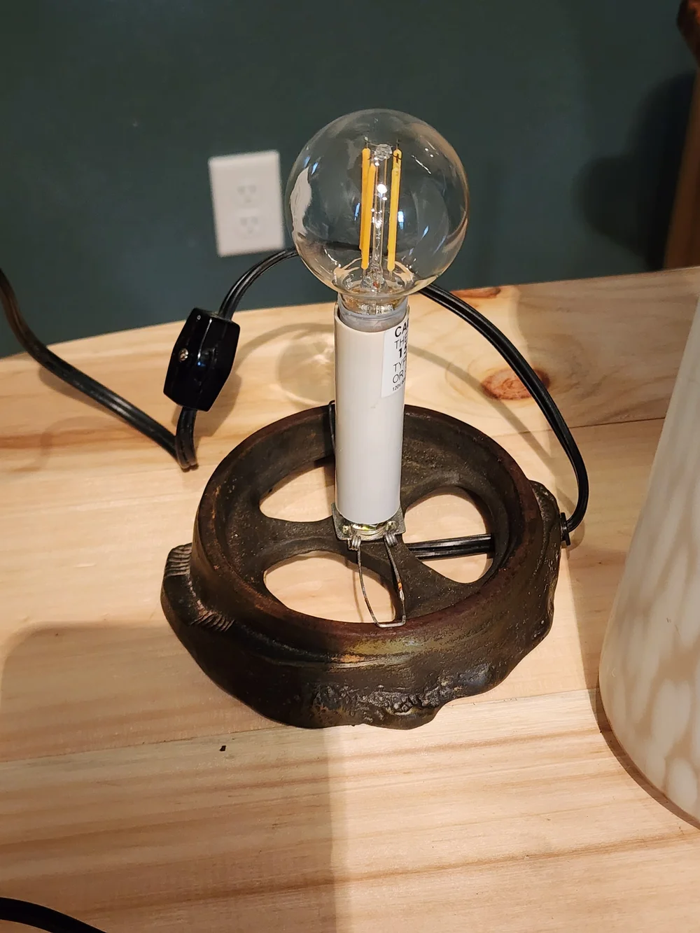 Vintage Frosted Art Glass Lighthouse Lamp with a brass-colored base
